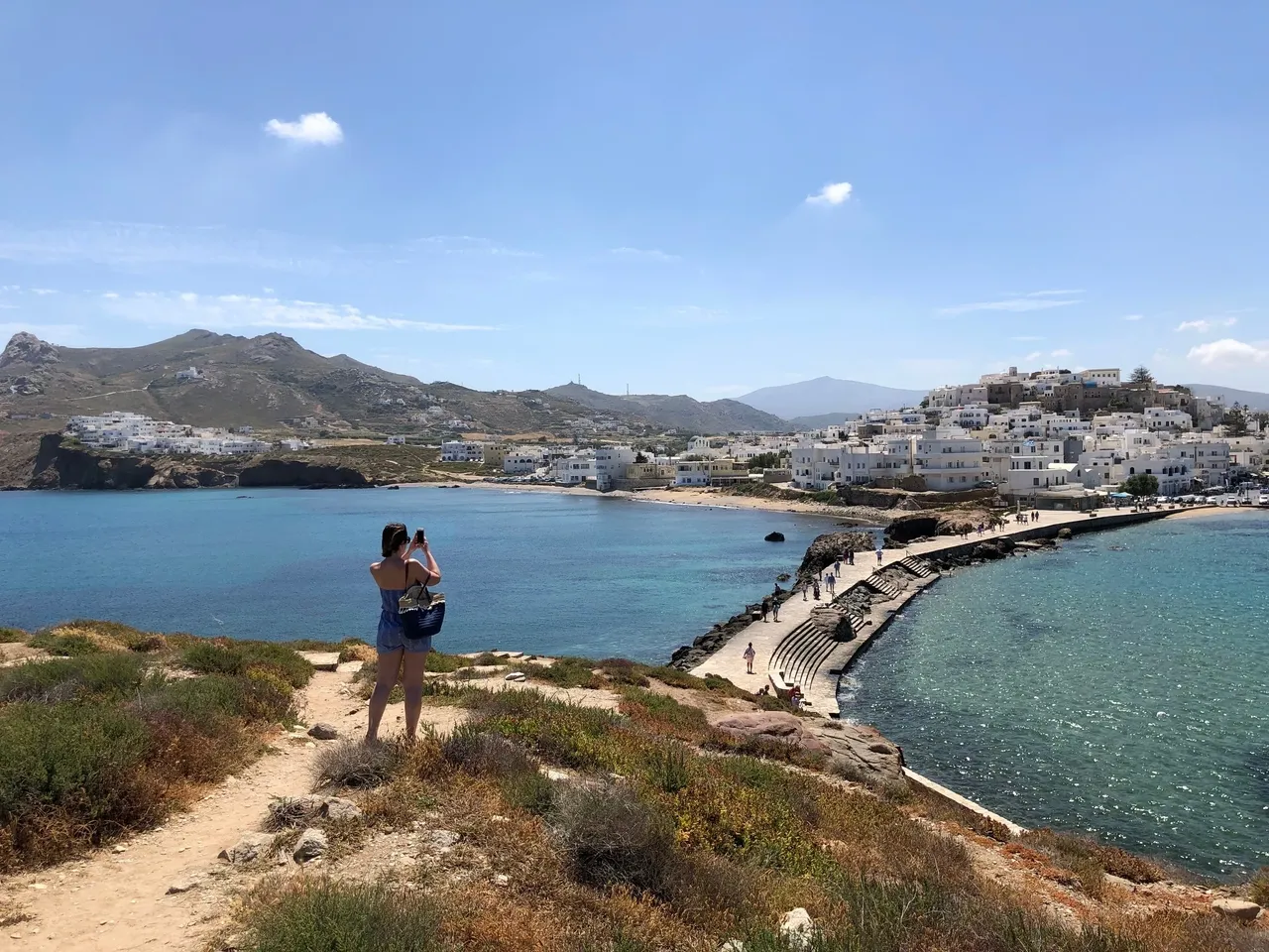 Woman on a Greek Island looking towards the sea